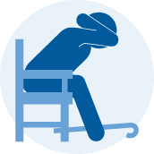 Person doing Sit Cover and Hold with a cane